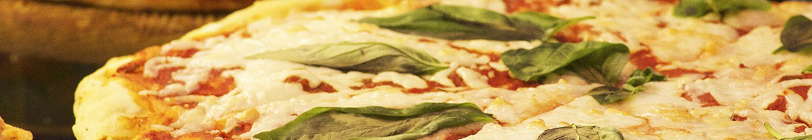 Eating Italian Pizza at La Bella Italia restaurant in Friendship, MD.